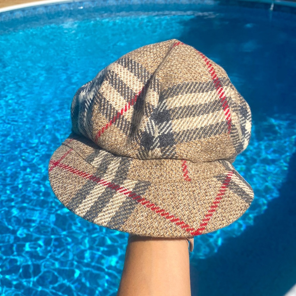 Authentic Burberry London hat size Medium. Excellent condition. Price negotiable